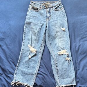 Distressed Blue Jeans